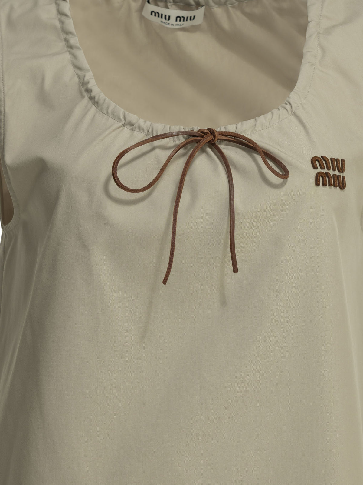 Miu Miu Short a-line dress with logo - Beige