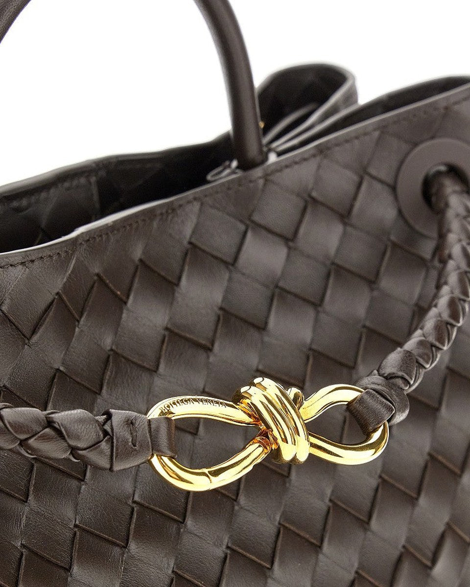 Close-up of the woven leather and metal knot on a Bottega Veneta Andiamo bag