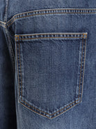 Givenchy Twisted stone-washed denim jeans - Dark Blue