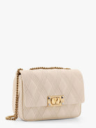 Valentino Garavani Valentino Garavani quiltie 67 leather medium shoulder bag with chain - Beige
