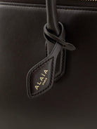 Alaïa Delta Medium leather handbag - Brun Fume