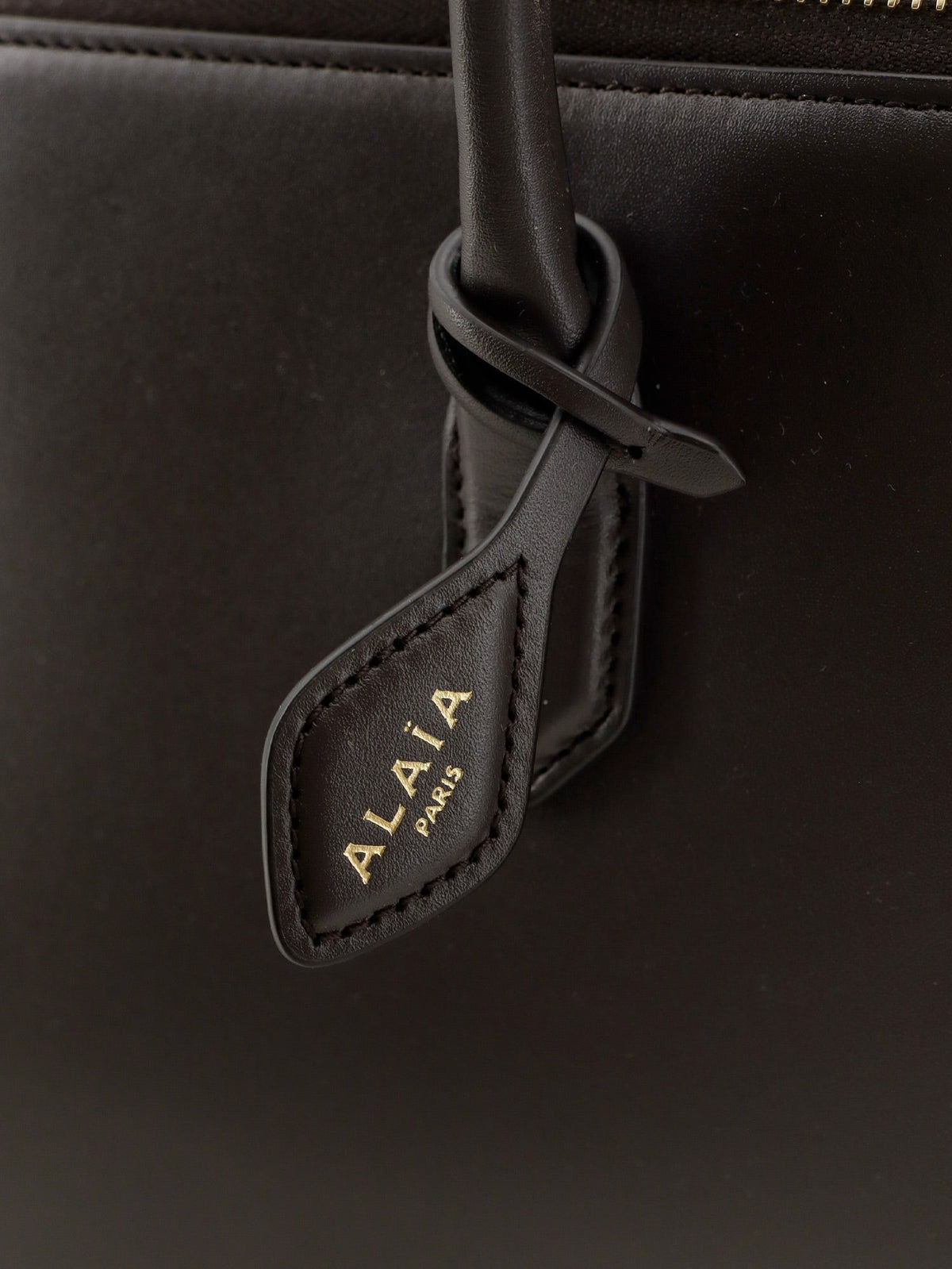 Alaïa Delta Medium leather handbag - Brun Fume