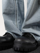 Balenciaga Leather boots with maxi rubber sole - Black
