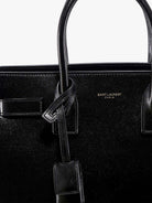 Saint Laurent Baby Sac de Jour leather handbag with padlock - Nero/Nero
