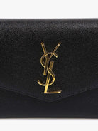 Saint Laurent Leather crossbody bag with metal Cassandre logo - Nero