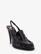 Saint Laurent Le Loafer 110 pumps with metal Cassandre logo - Nero