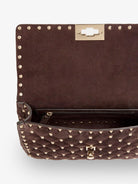 Valentino Garavani Rockstud Spike suede crossbody bag with iconic all-over studs - Ebonybrown
