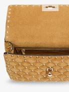Valentino Garavani Rockstud Spike suede crossbody bag with iconic all-over studs - Havanabeige