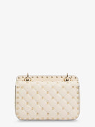 Valentino Garavani Rockstud Spike leather shoulder bag with iconic all-over studs - Lightivory