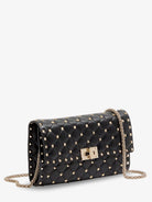 Valentino Garavani Rockstud Spike leather shoulder bag with iconic all-over studs - Nero