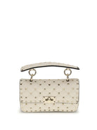Valentino Garavani Rockstud Spike mini Top Handle Bag in nappa - Light Ivory