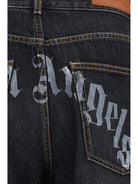 Palm Angels Wide-leg Jeans with back logo - Vintage Black