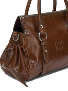 Miu Miu Small handbag with logo - Brown